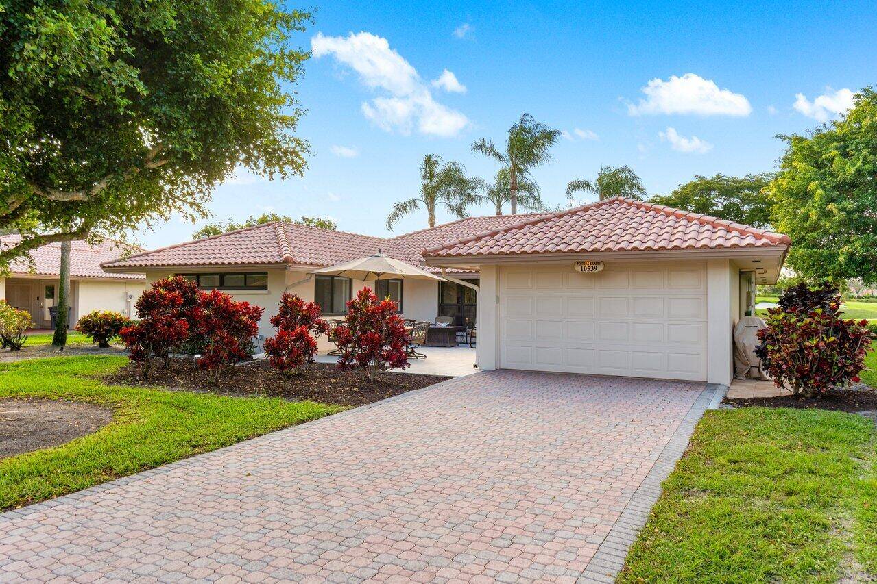 Exceptional lake golf views on the newly designed North course from this beautifully updated villa, offering a perfect blend of comfort and style.