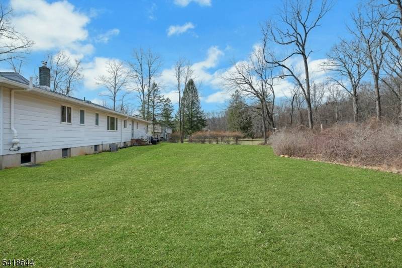 Welcome Home ! Near the end of a peaceful cul de sac, this well maintained 3 bedroom, 2 bath ranch sits on a level 125x250 lot, just shy of an ...