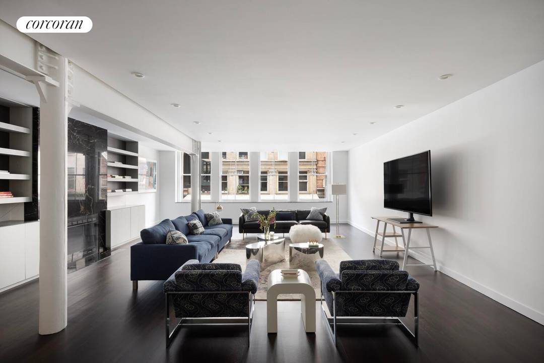 Apartment 2B at 39 North Moore Street is a classic Tribeca loft, thoughtfully updated while preserving its authentic character.
