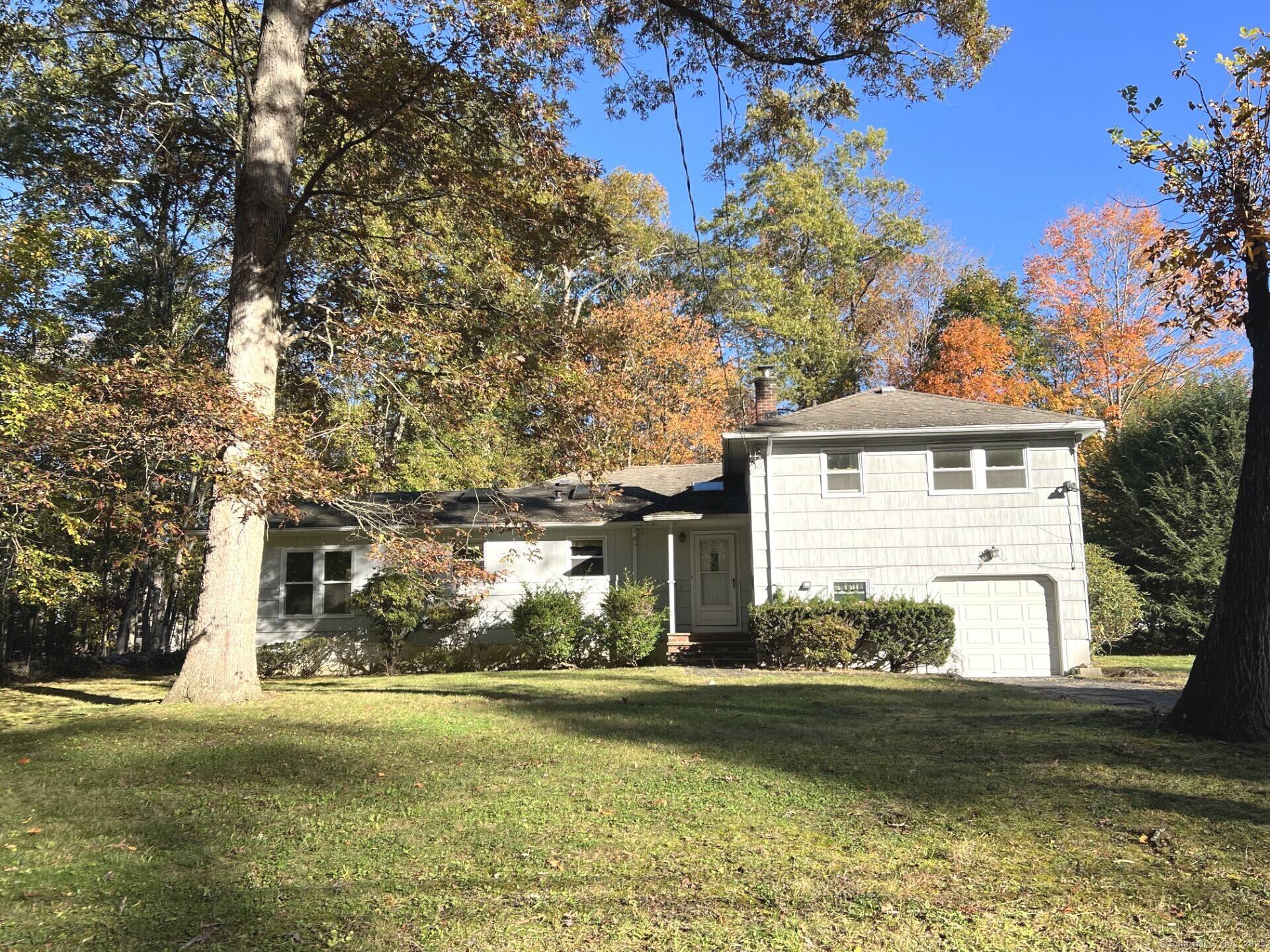 One of a kind opportunity to transform this lost 1950s Split Level residence squirreled away at the very end on Putter Drive.