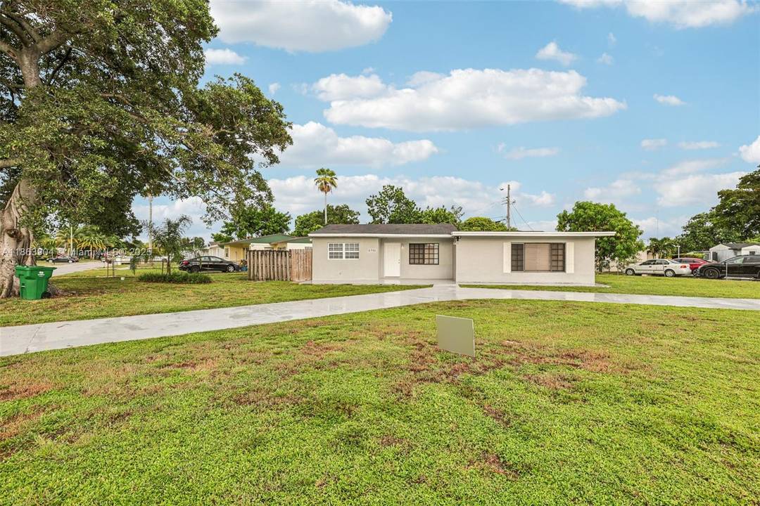 Welcome to this 4 bedroom, 2 bath, 1, 540 sq ft home in Miramar, offering a covered front porch entry and a bright, inviting layout.