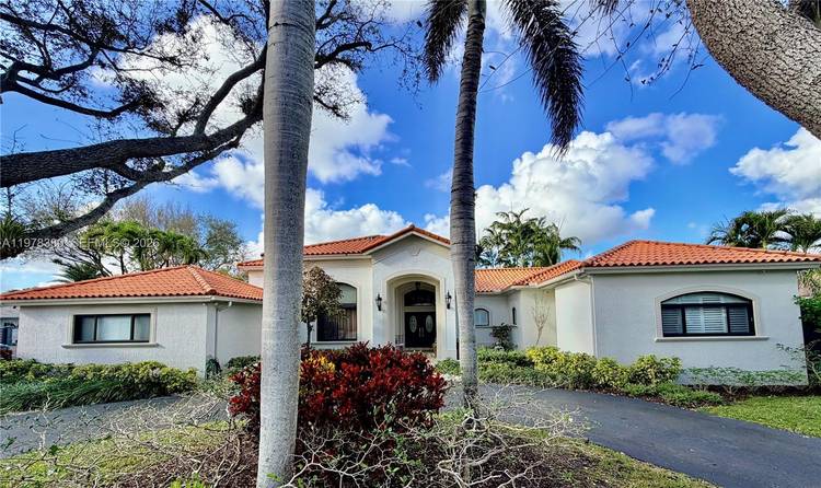 Welcome to this custom built Mediterranean style home designed for both comfort and style.