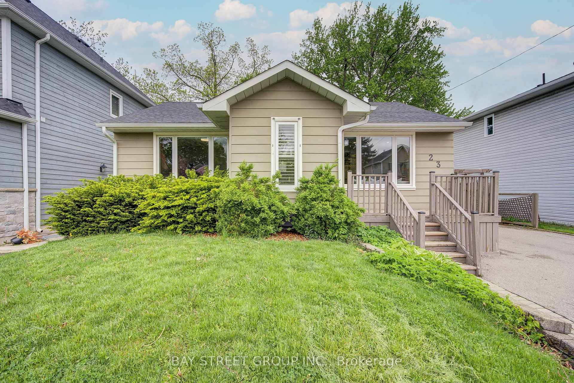 Charming Bungalow in the Heart of Kerr Village Prime Location with Endless Potential.