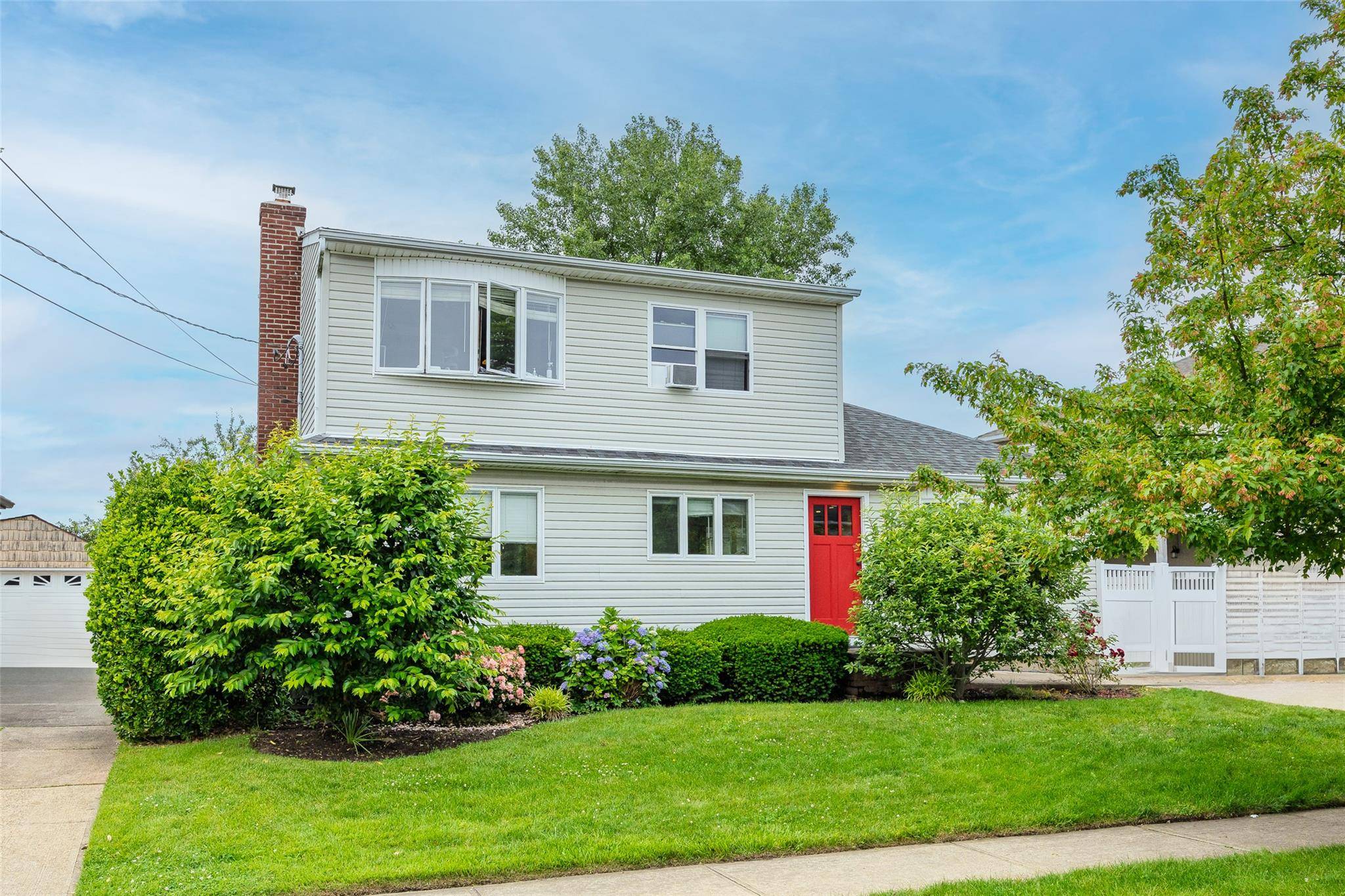 Welcome to this ultra trendy 4 bedroom, 2 bathroom home with an open floor located in South Bellmore.