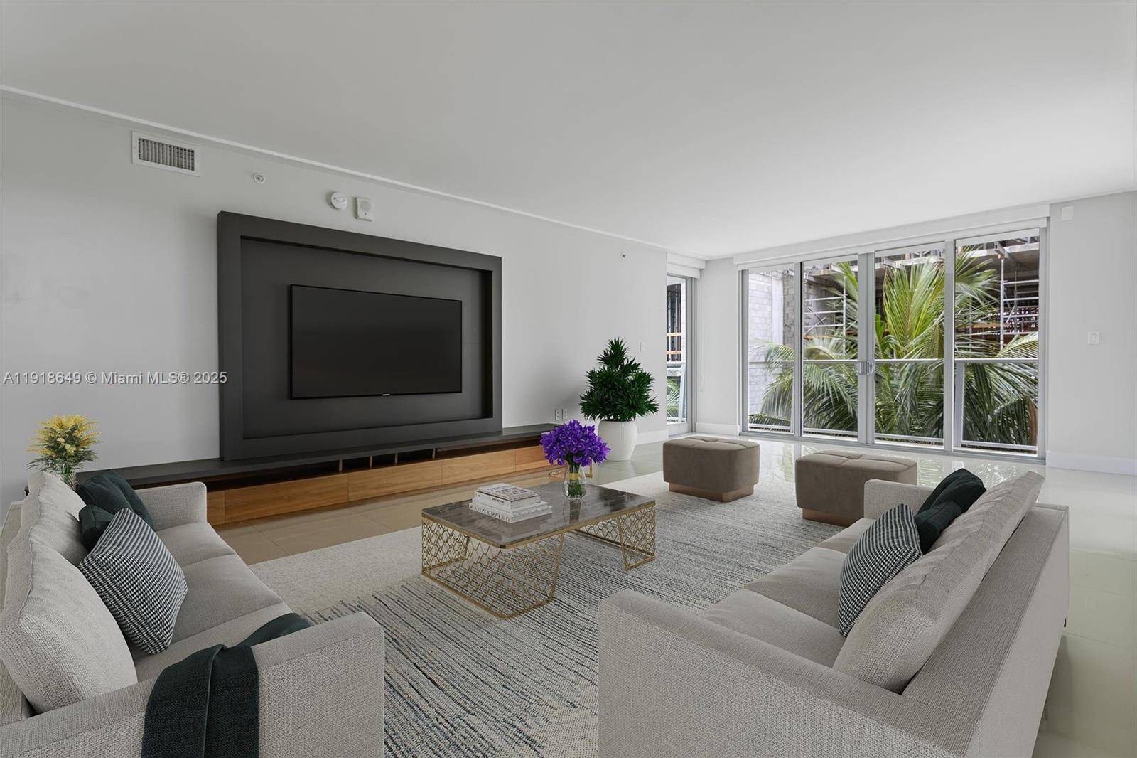 This stunning corner unit boasts a sleek, modern design with 3 bedrooms and 2 bathrooms.