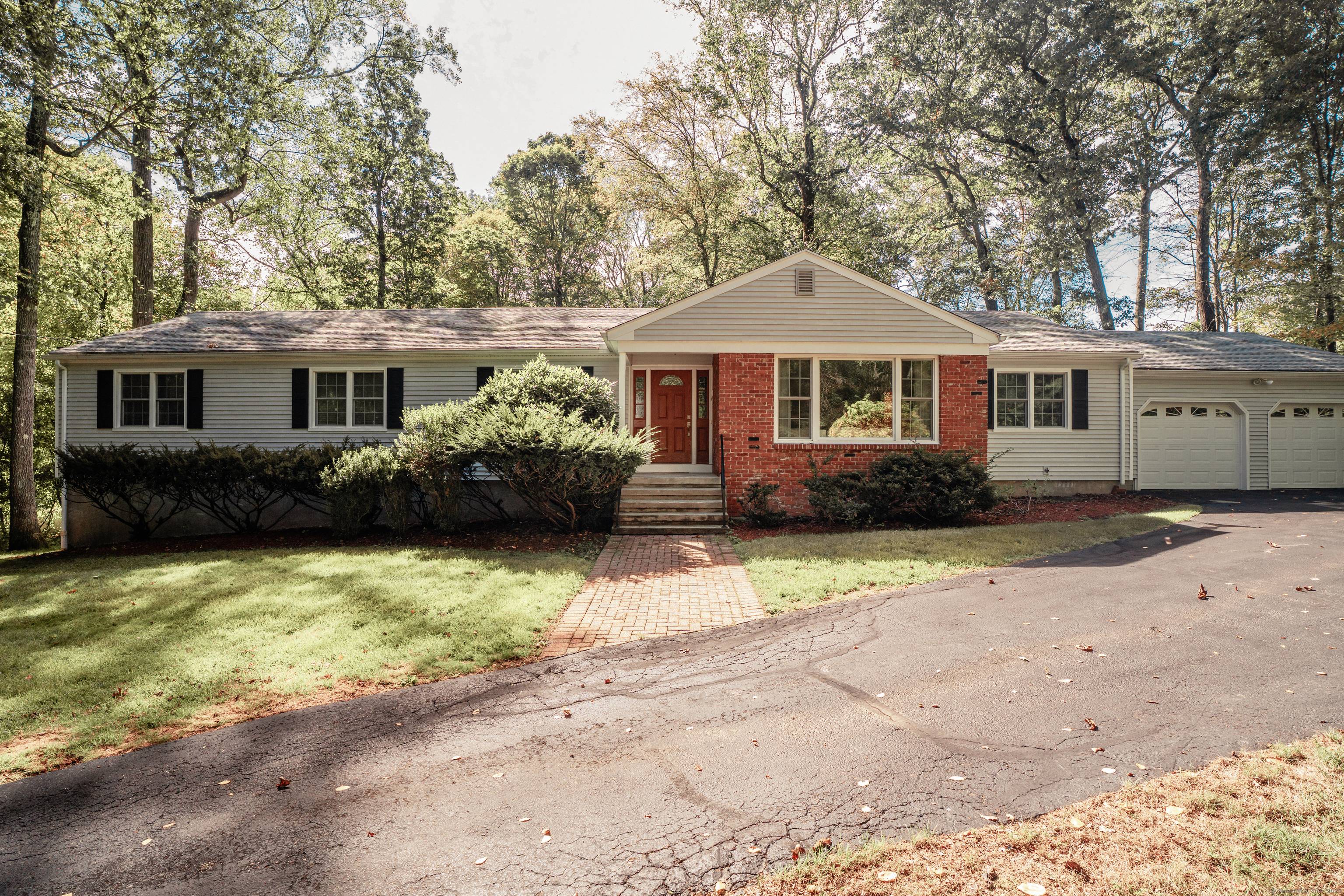 Stunning and spacious, this 4 bedroom, 3 bath ranch is perfectly situated at the end of a highly sought after cul de sac in Central Woodbridge.