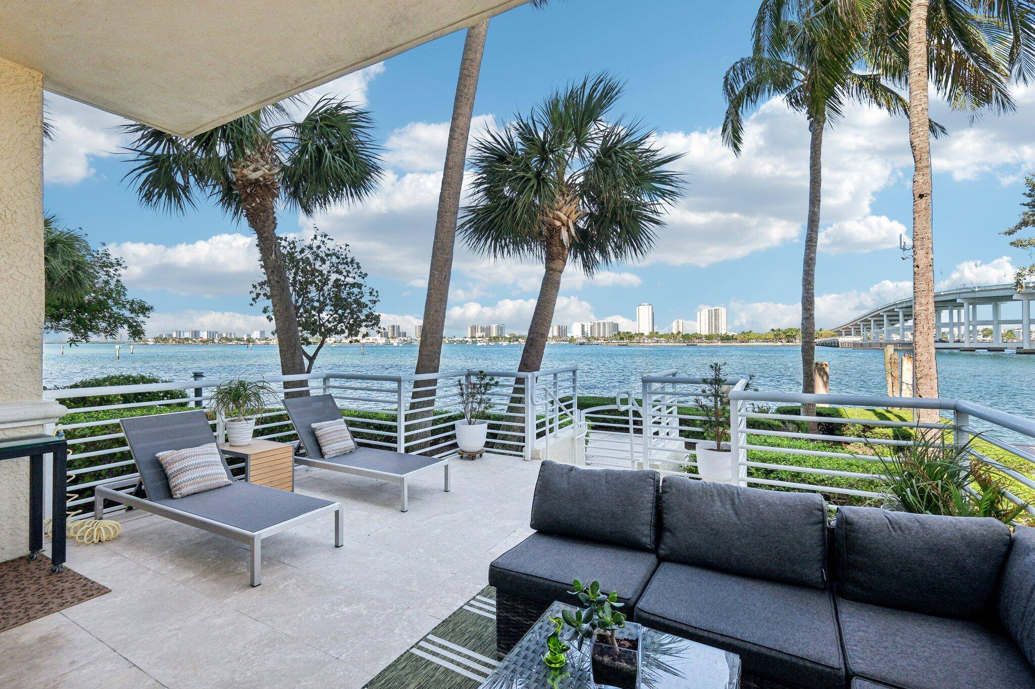 Discover a rare opportunity to own an exceptional first floor turnkey designer residence in a private corner location, offered at 879, 000.
