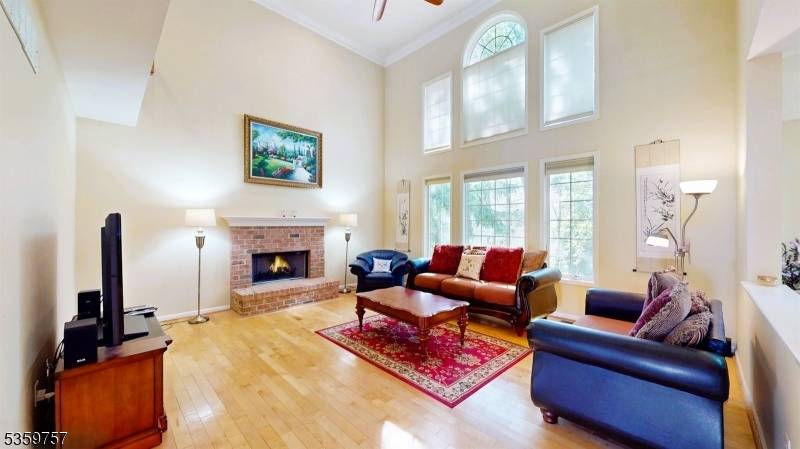 Nestled in the highly sought after Patriot Ridge neighborhood of The Hills, this classic colonial of Richmond Model boasts timeless elegance and modern functionality.