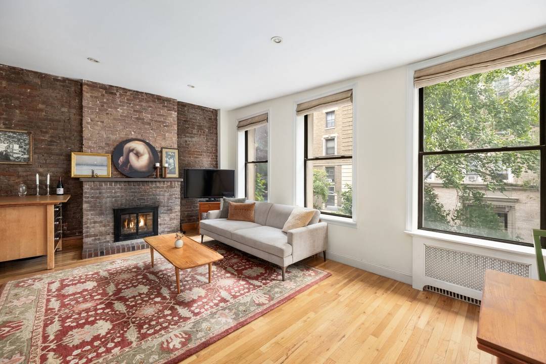 Charming pre war 1 bedroom convertible 2 bedroom on tree lined upper west side block Step into the spacious, light filled living room with triple, oversized windows looking onto the ...