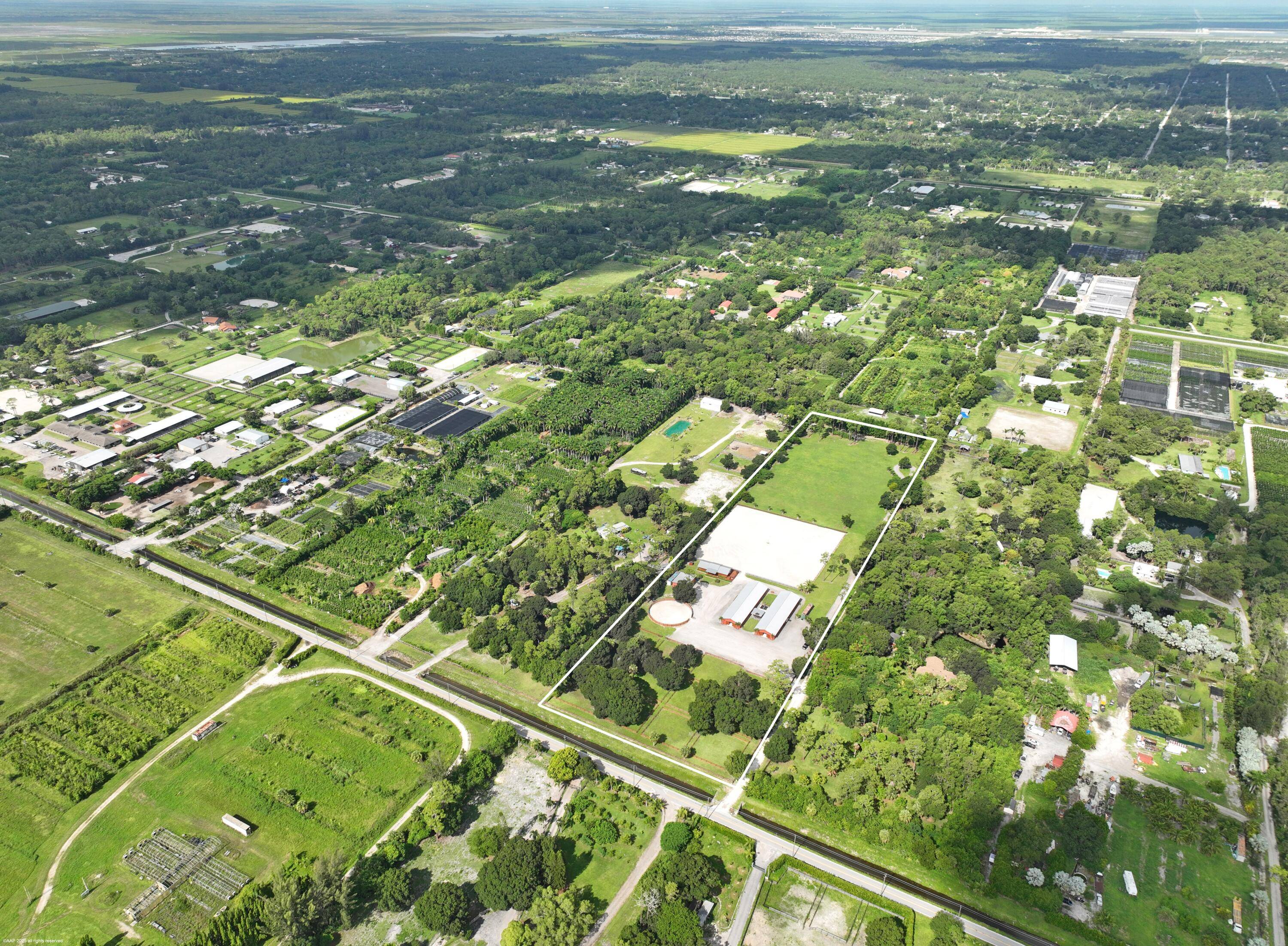 A private training oasis with 2 barns totaling 26 stalls, oversized arena measuring 250 x 250, 4.
