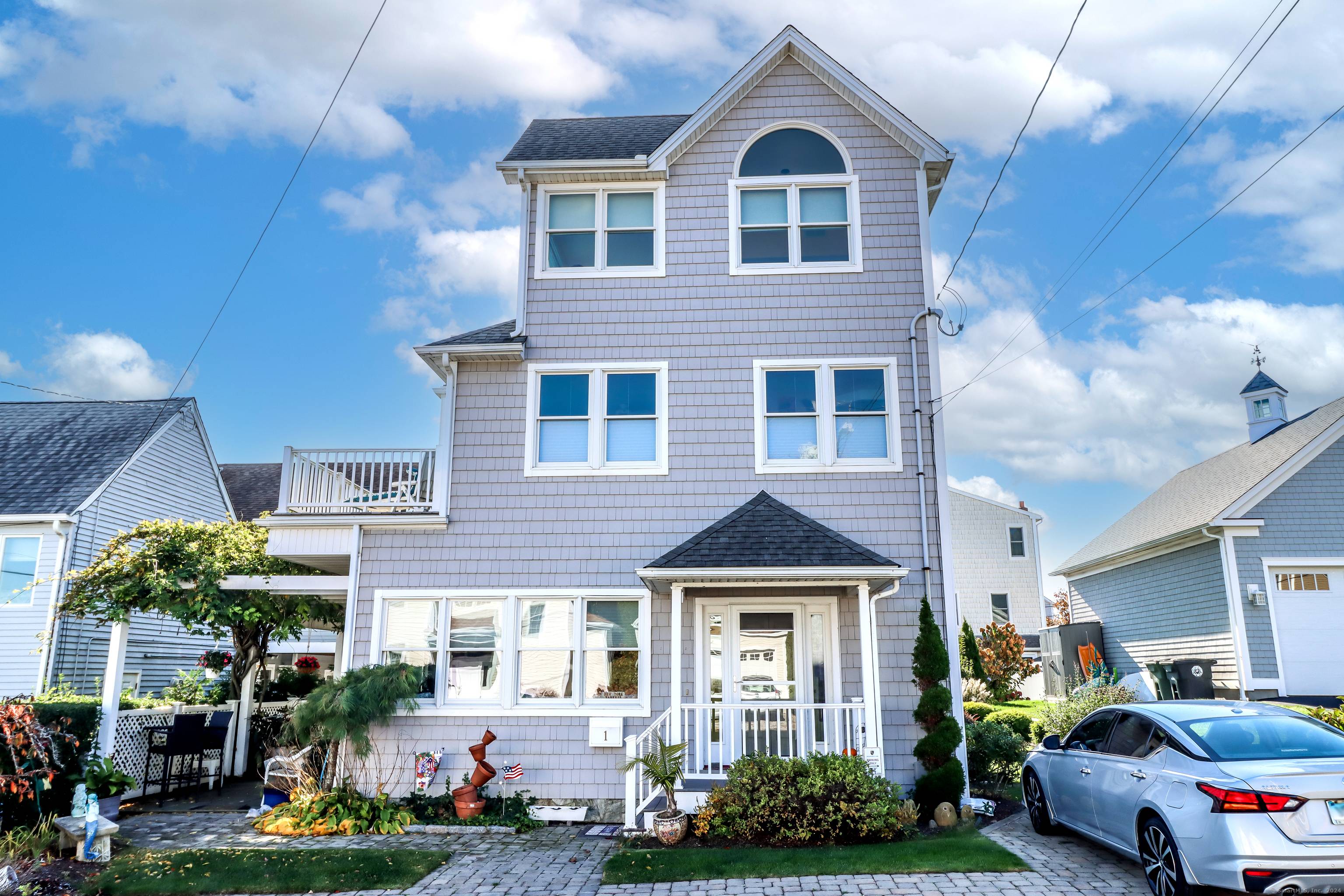 LOCATION, LOCATION ! ! ! Live in luxury across from the beach, and be part of the Woodmont community.