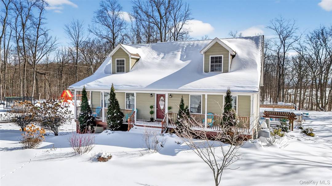 Set on over 5 acres and beautifully landscaped, this inviting home delivers space, comfort, and resort style living at home.