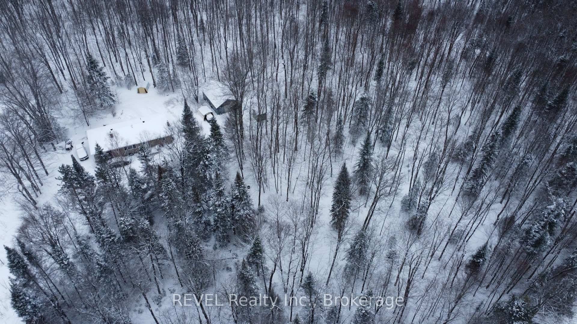This beautiful and private, 20 acre, is heavily treed, with a Maple Bush, a meadow, pond, trails, a 1062 sq ft bungalow plus a walkout basement, outer buildings, may be ...