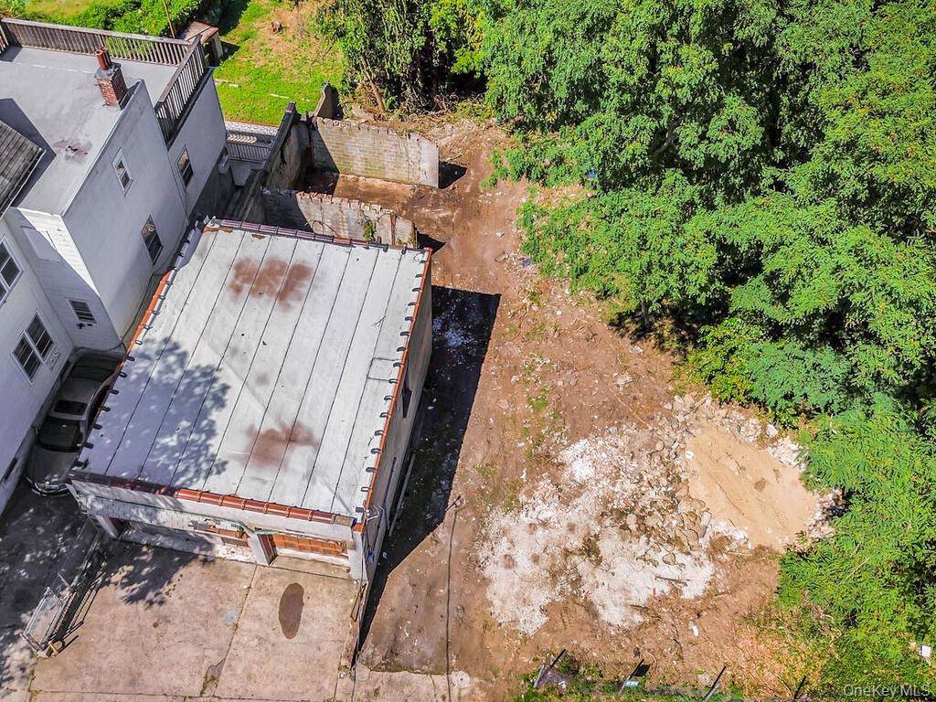 Flat lot with gentle slop to the rear.