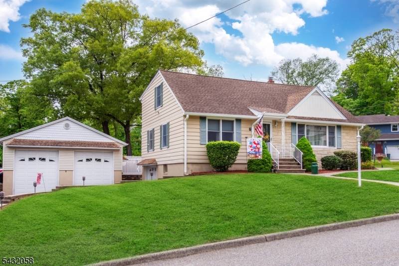 Welcome to this immaculate Cape Cod set on a great lot in the heart of Bloomingdale !