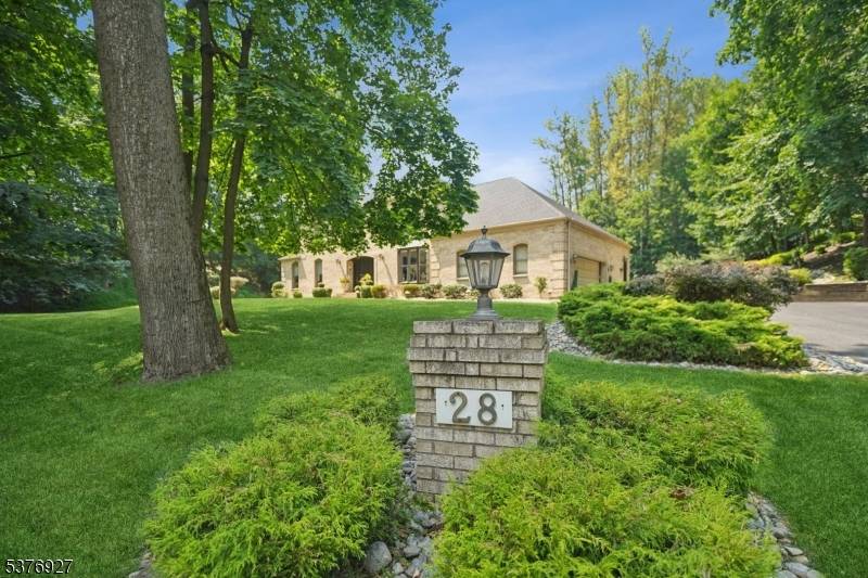 Located in the historic gated community of Llewellyn Park.