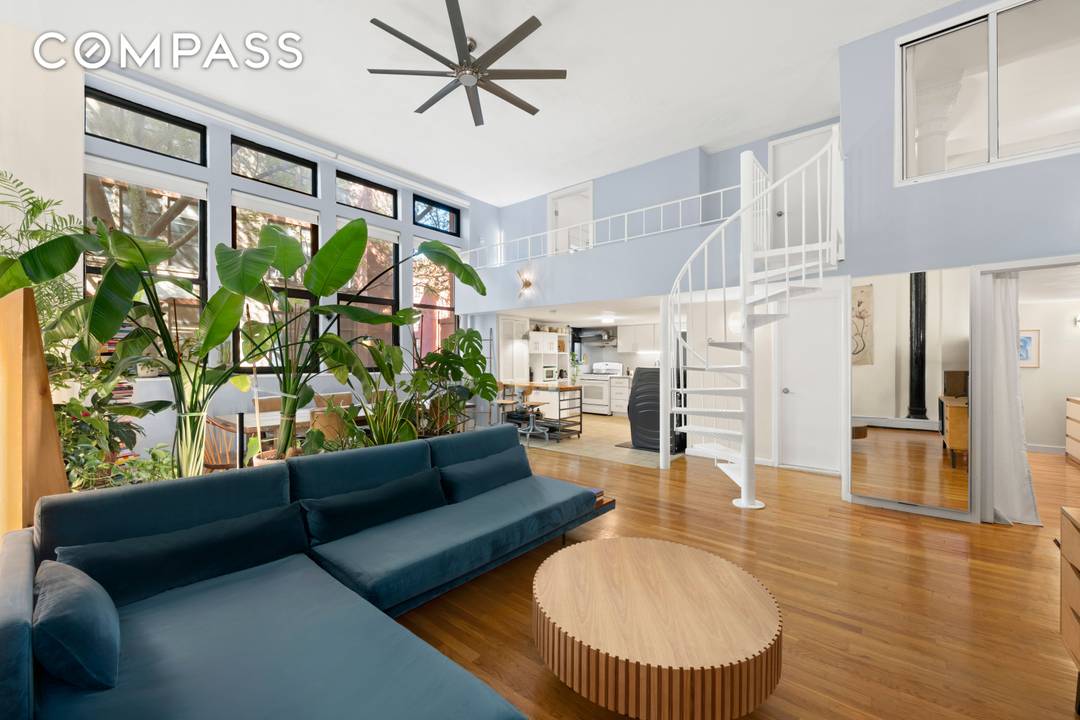 Step into this one of a kind three bedroom, two bathroom duplex loft in a historic schoolhouse, transformed into a boutique haven that s anything but ordinary.