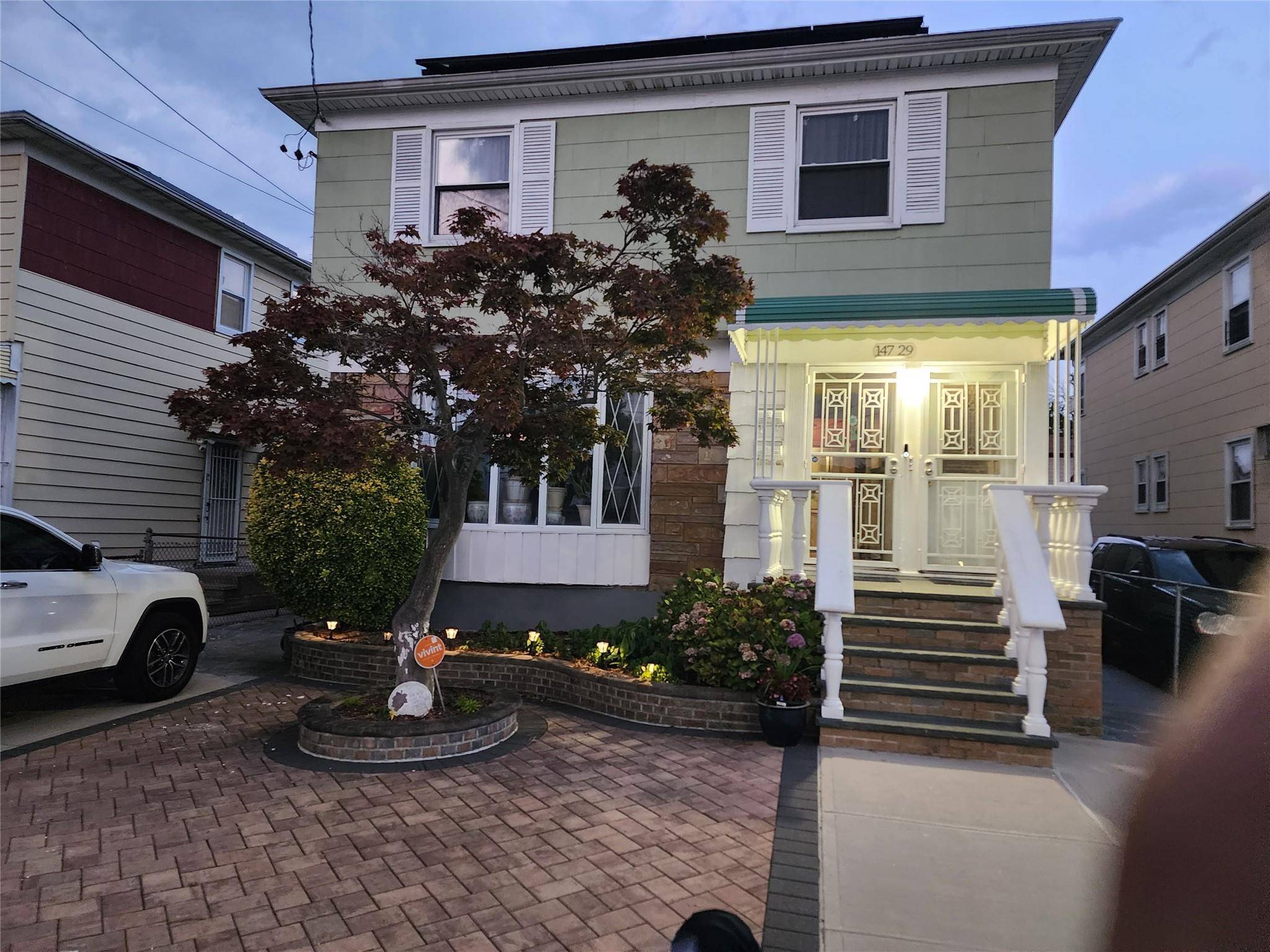 THIS FULLY DETACHED 2 FAMILY HOUSE FEATURES 2 SEPARATE APARTMENTS HAVING 3 BEDROOMS AND 1.
