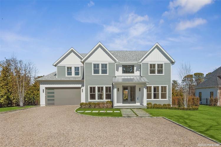 Now complete, this stunning new transitional home has a Wow factor of 10 at every turn.