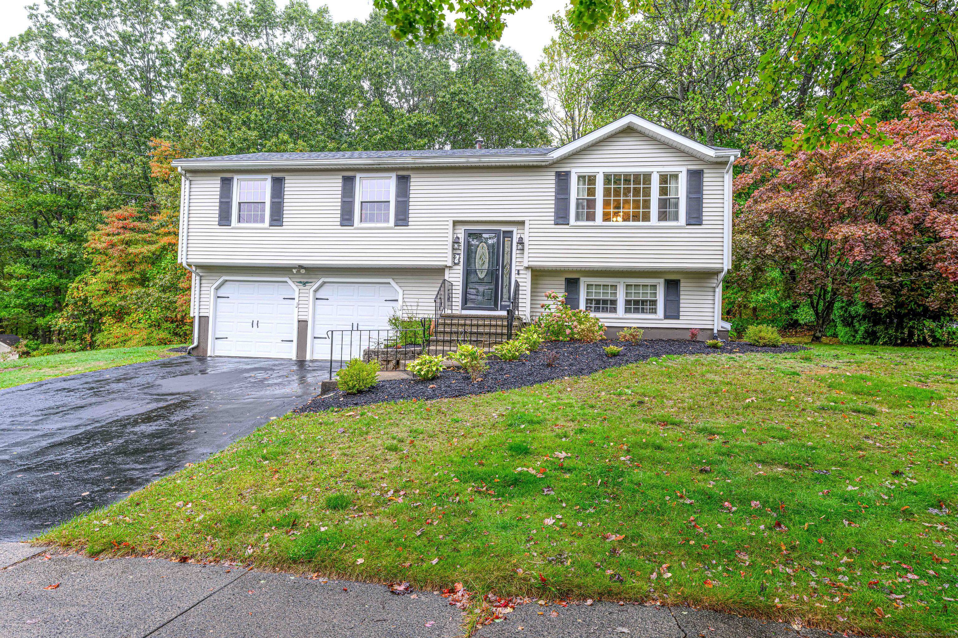 Welcome to this beautifully updated 3 bedroom, 3 full bath Raised Ranch in East Haven, CT.