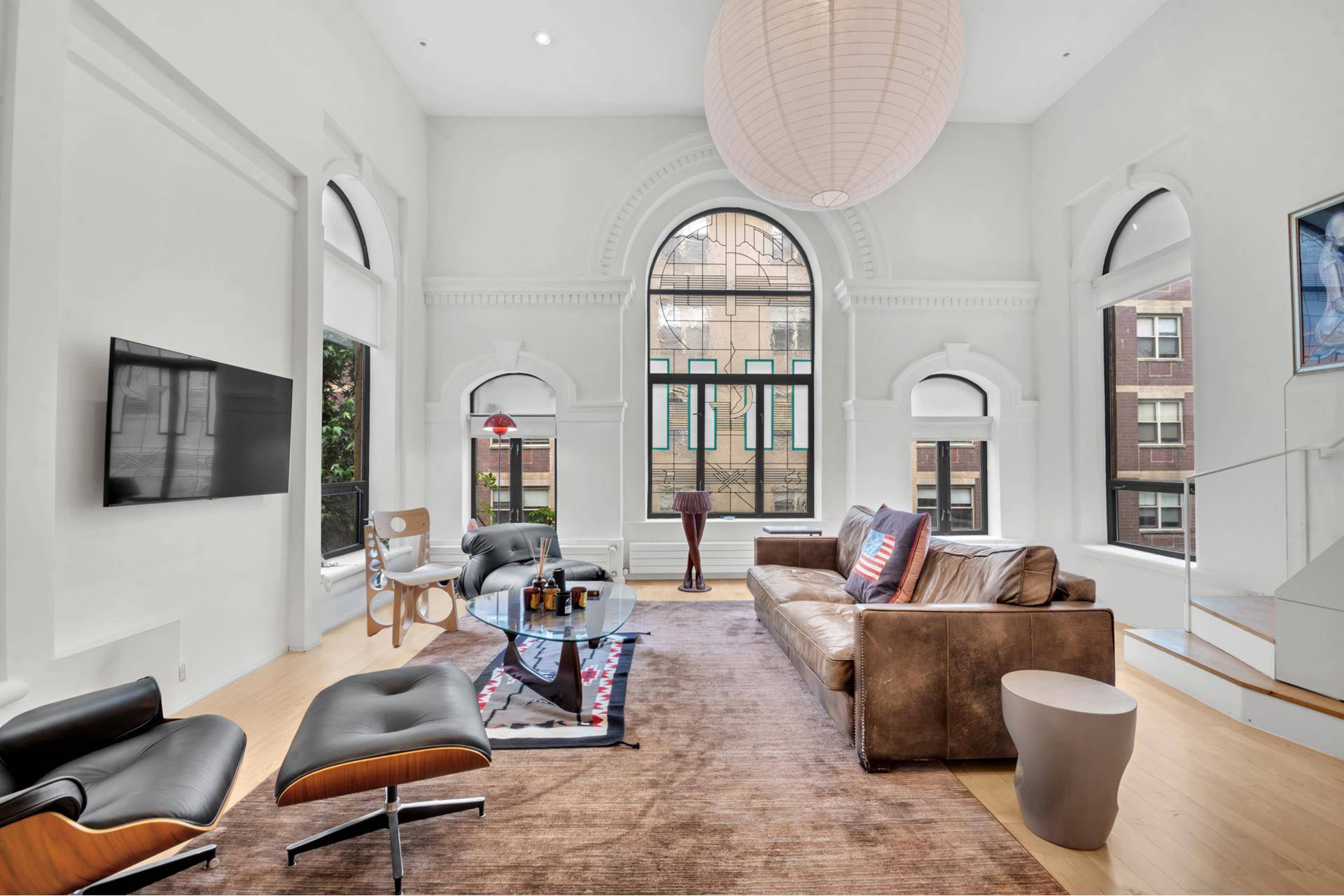 This spectacular triplex penthouse delivers a sense of scale and serenity rarely found in Manhattan.
