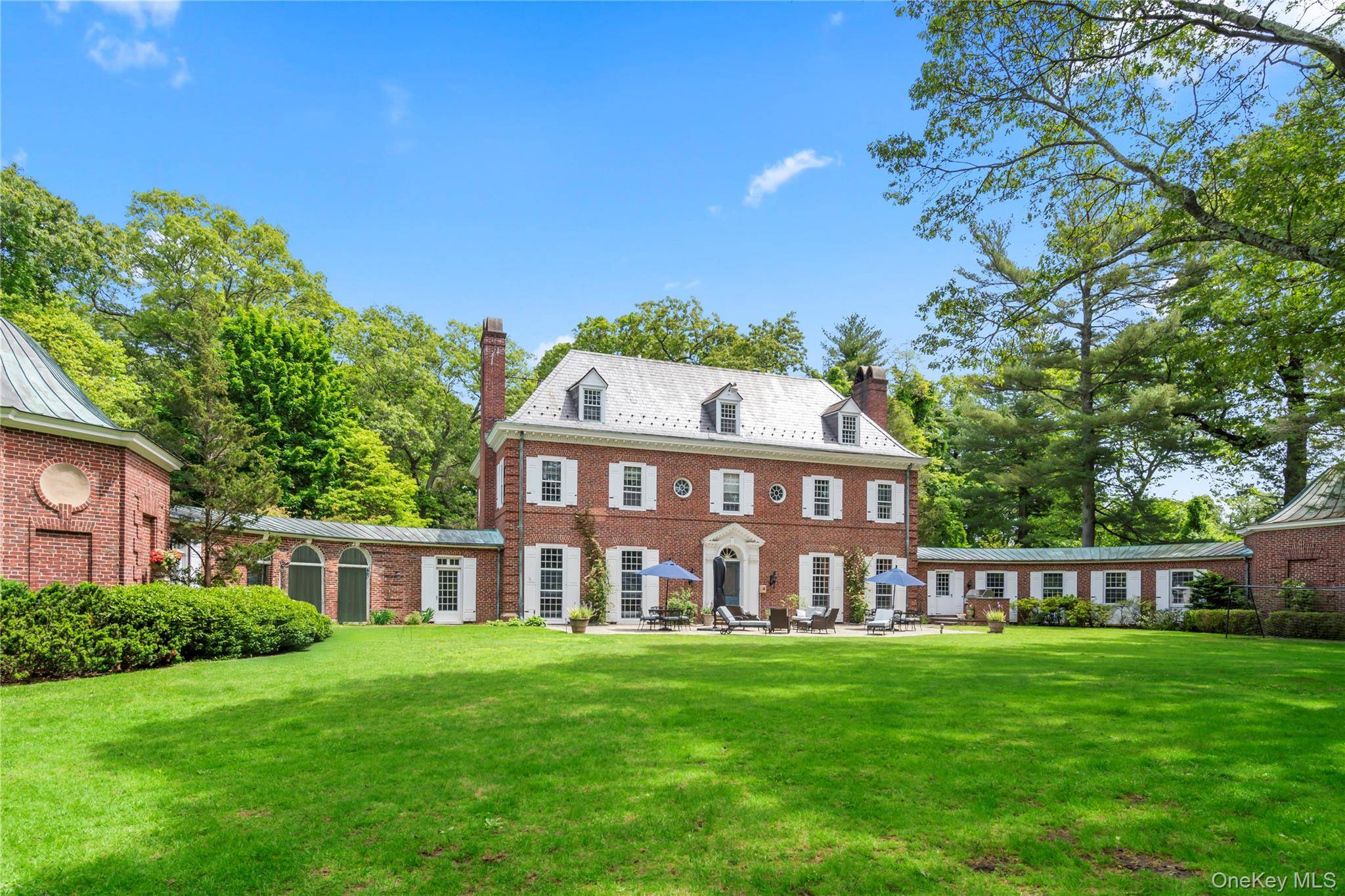 OLD WESTBURY. ICONIC COLONIAL REVIVAL MANOR Set on 2.