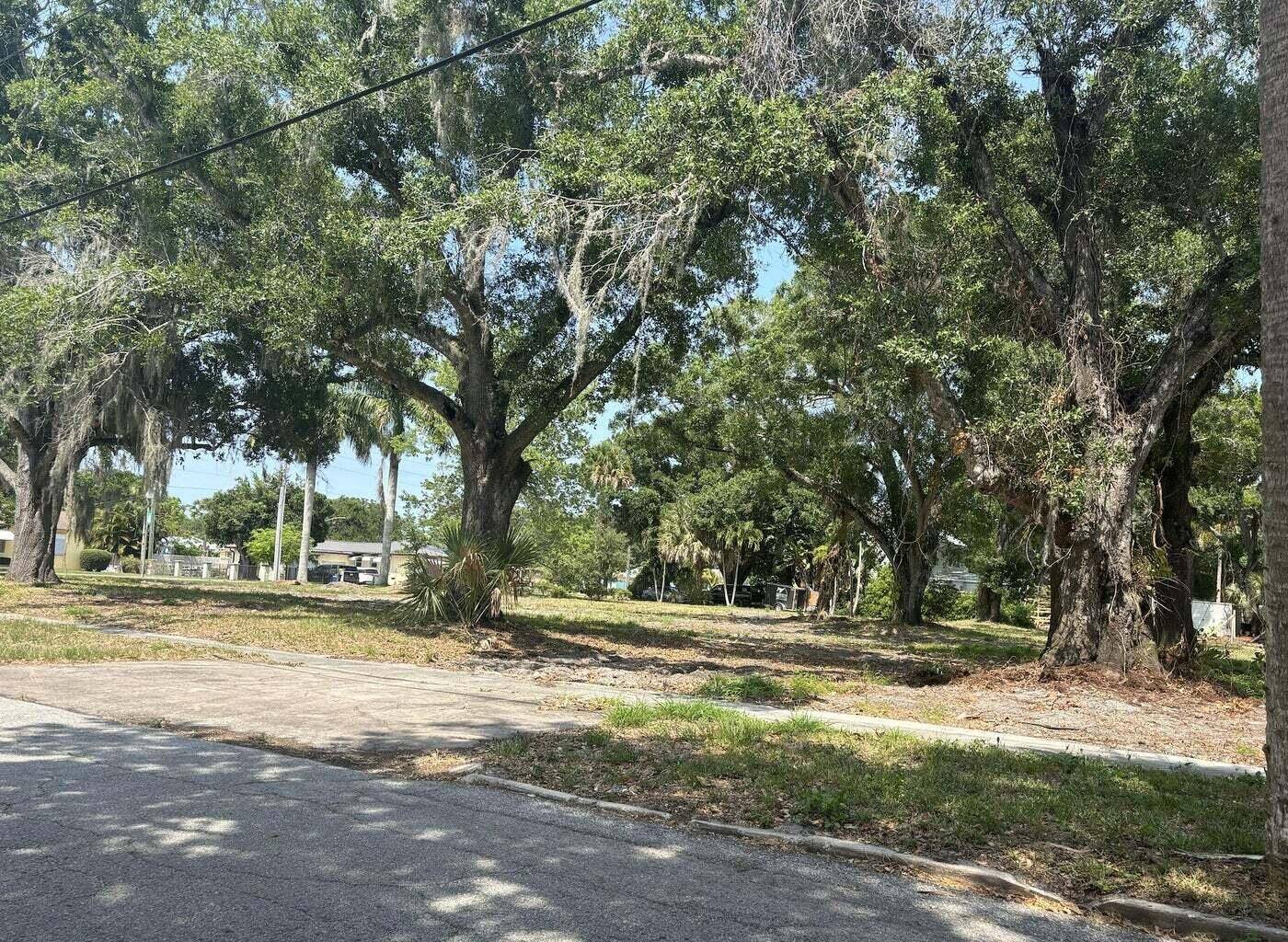 Beautiful oversized. 41 acre lot in Pinewood subdivision of Central Fort Pierce.