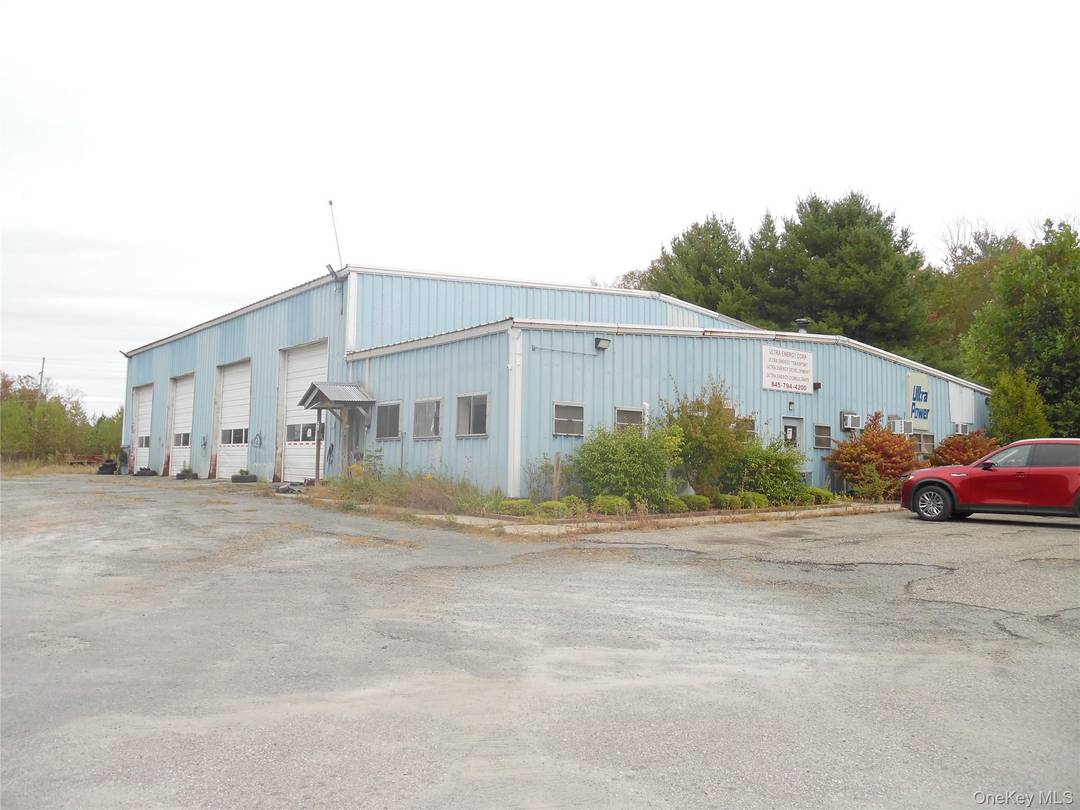 Bulk storage fuel facility and warehouse located on 6 level and cleared industrial acres located next to the Monticello Raceway.