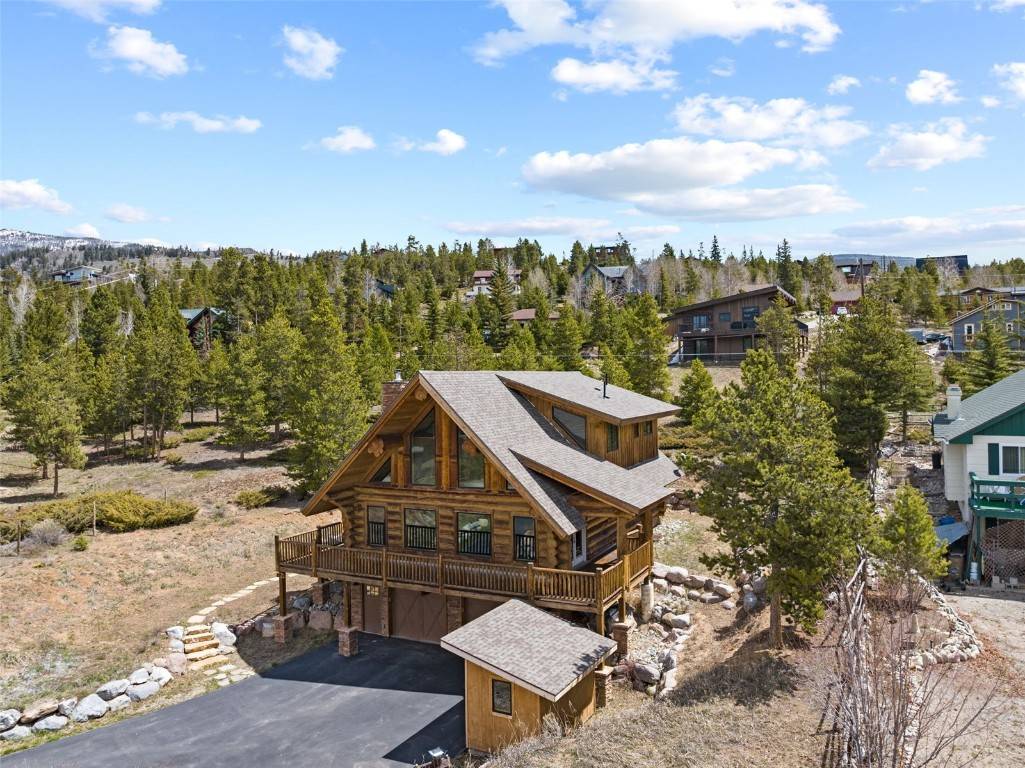 Large 3 bedroom log home nestled in picturesque Silverthorne, offering breathtaking views of the Gore Range.