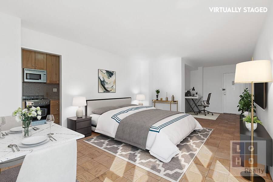 High floor studio with views of the Lower East Side and downtown Manhattan amp ; Brooklyn !