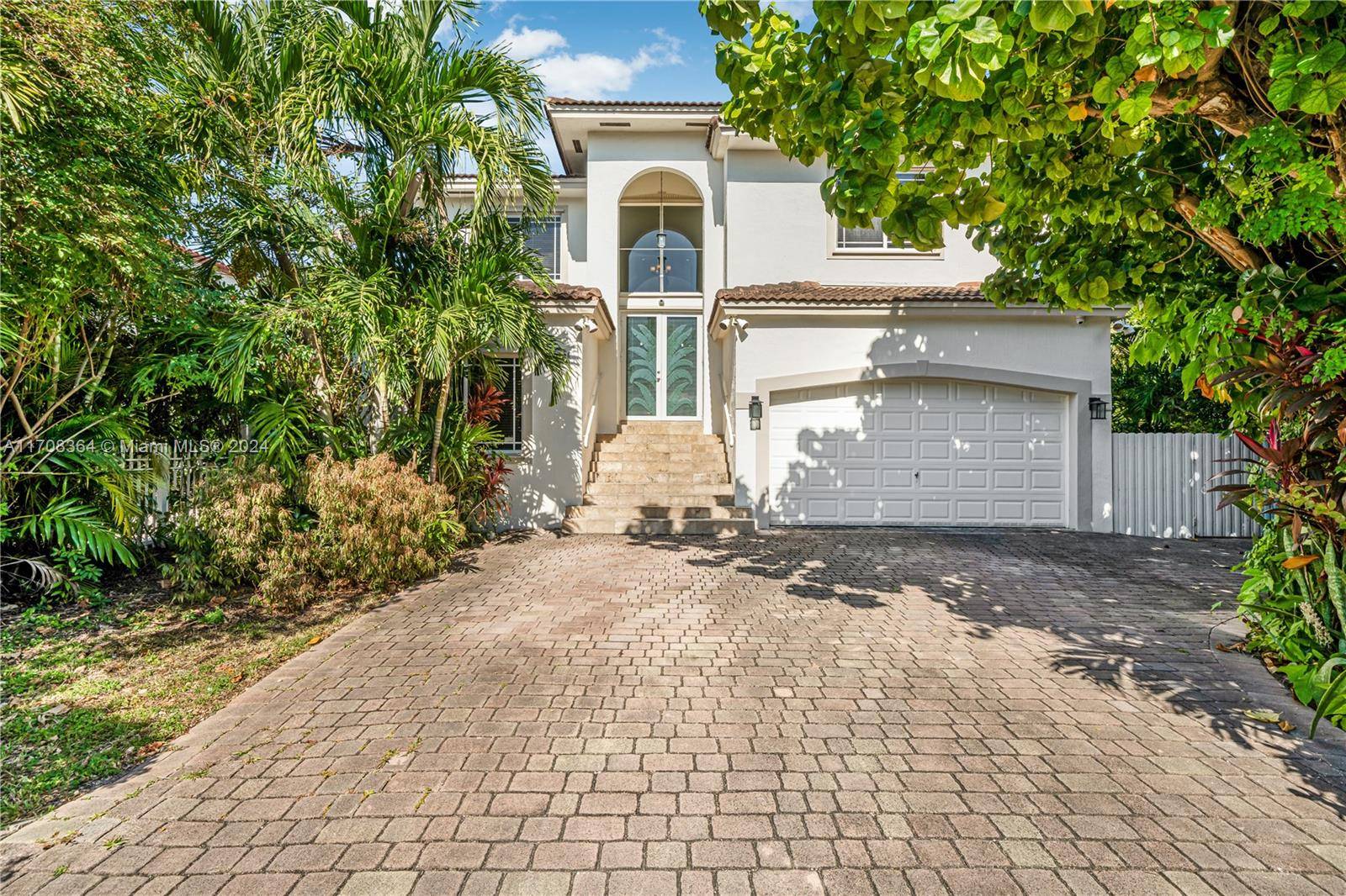 Discover this elegant 5 bedroom, 4.
