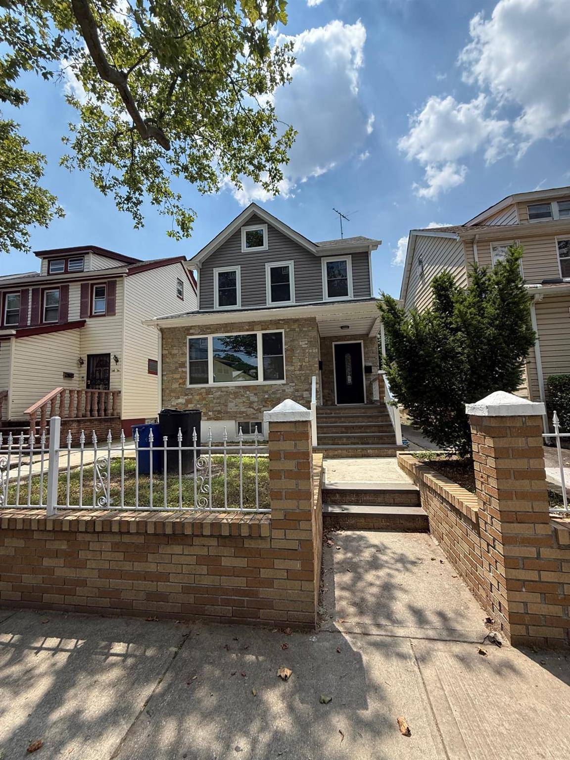 Welcome to this beautifully renovated two family detached home, ideally located on a quiet block in a sought after Rosedale neighborhood.