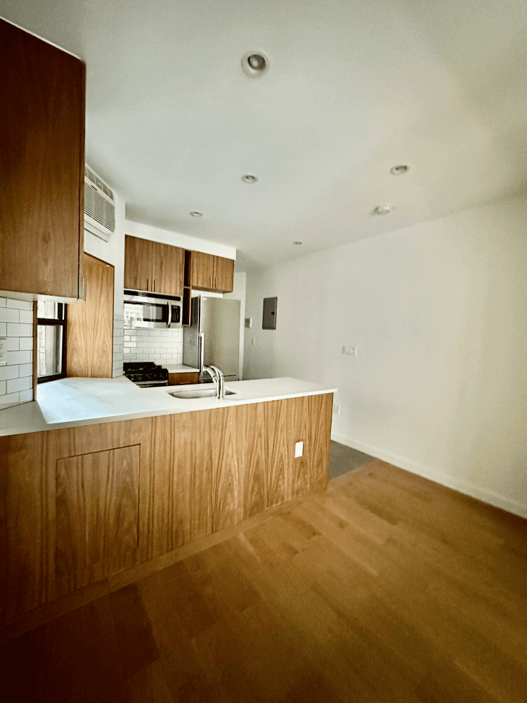 Welcome to this sparkling clean, gut renovated apartment located just one flight up in a beautifully updated building.