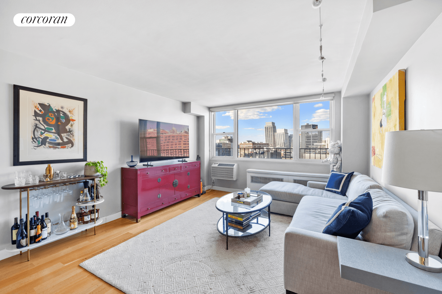 This stunning one bedroom apartment commands sweeping northwest views, capturing the serene expanse of the Hudson River and the iconic Manhattan skyline, with the Empire State Building as a distant ...