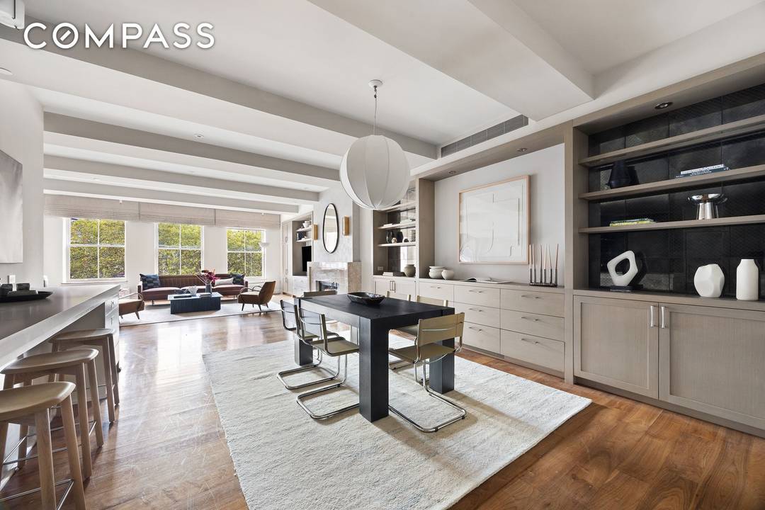 This spacious three bedroom, two and a half bath duplex spans over 2, 300 square feet and is ideally situated just across from Duane Park.