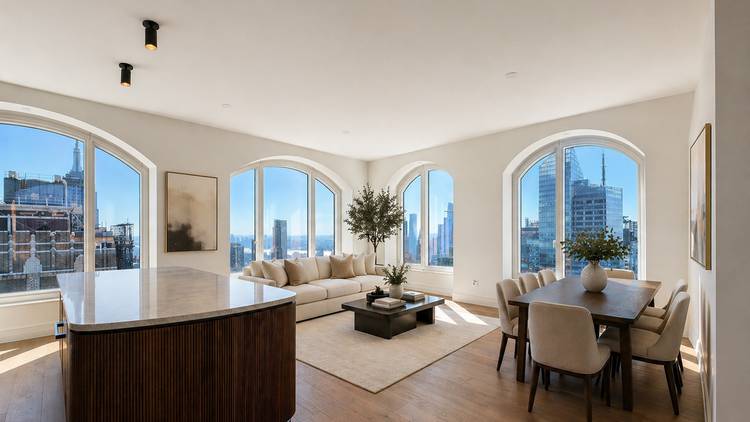 This stunning half floor one bedroom offers a breathtaking triple exposure great room with sweeping south, west, and north views, capturing Central Park, the Hudson River, and Bryant Park through ...