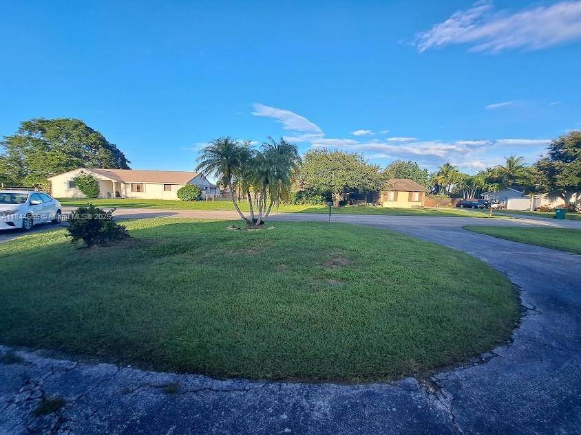 Single family 5 bedroom, 3 bathroom home with a new roof, the kitchen, and 1 bathroom.