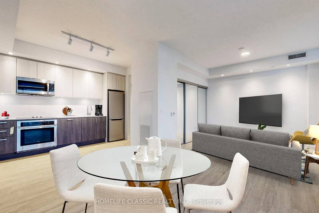 Welcome to this bright, spacious, and beautifully designed 2beds, 2 baths plus den corner suite 1, 032 sq ft offering unmatched value with two private balconies showcasing breathtaking Lake Ontario ...