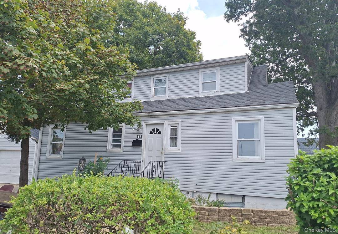 Cape Style Home. This Home Features 4 Bedrooms, 2 Full Baths, Formal Dining Room, amp ; 1 Car Garage.