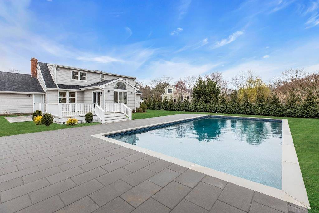 Welcome to 845 Rosewood a completely updated cape style home on a level, just shy half acre property.