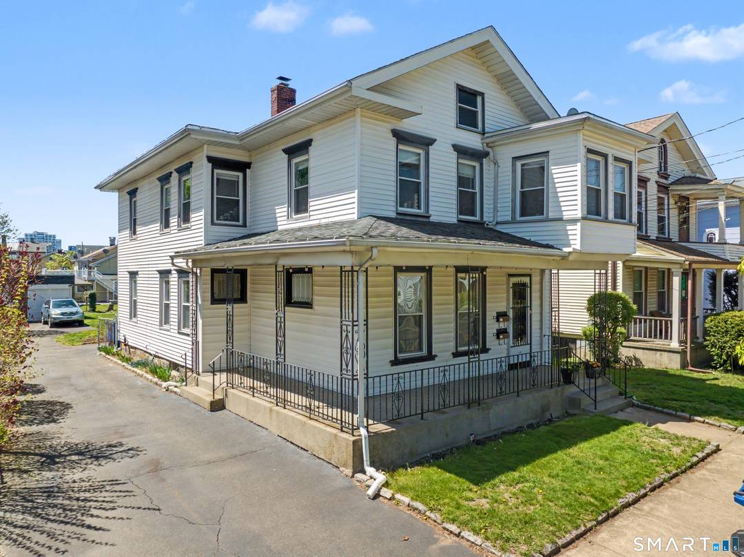 Updated two family house with a 2 car garage in the heart of East Rock steps from gourmet markets, restaurants, the Yale Shuttle and public transportation.