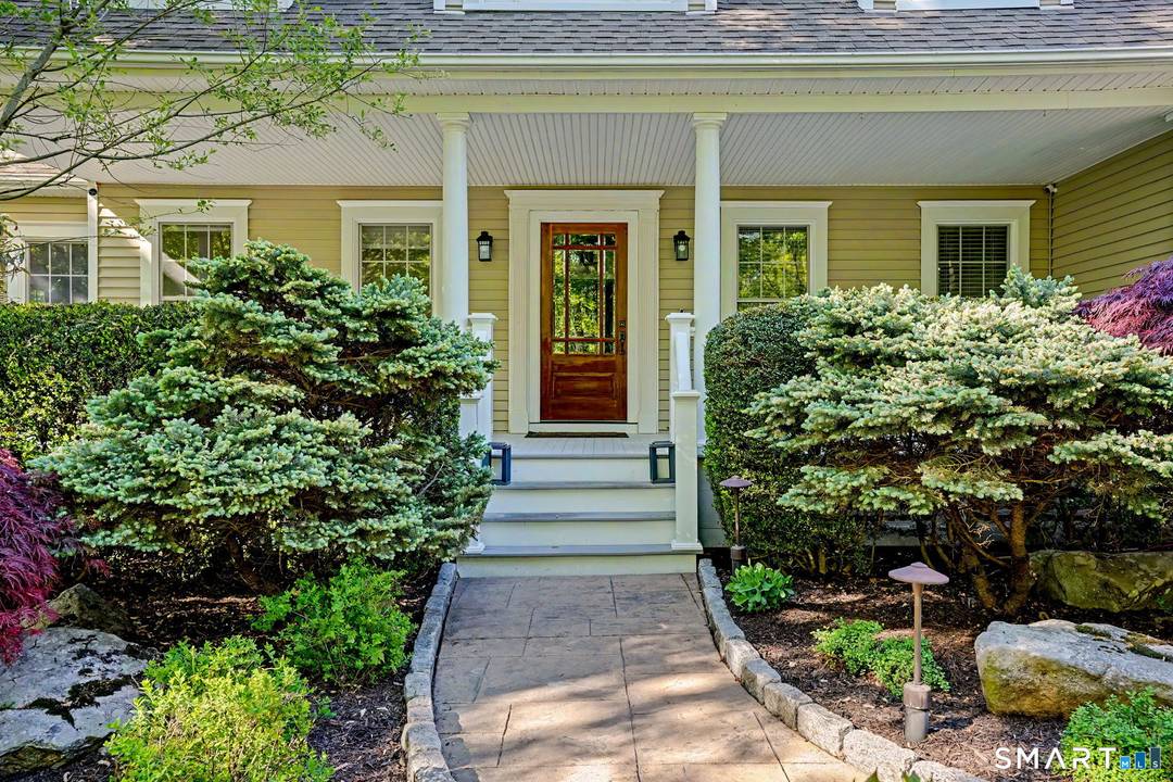 Totally remodeled custom Cape Cod style home blending contemporary design with casual elegance.