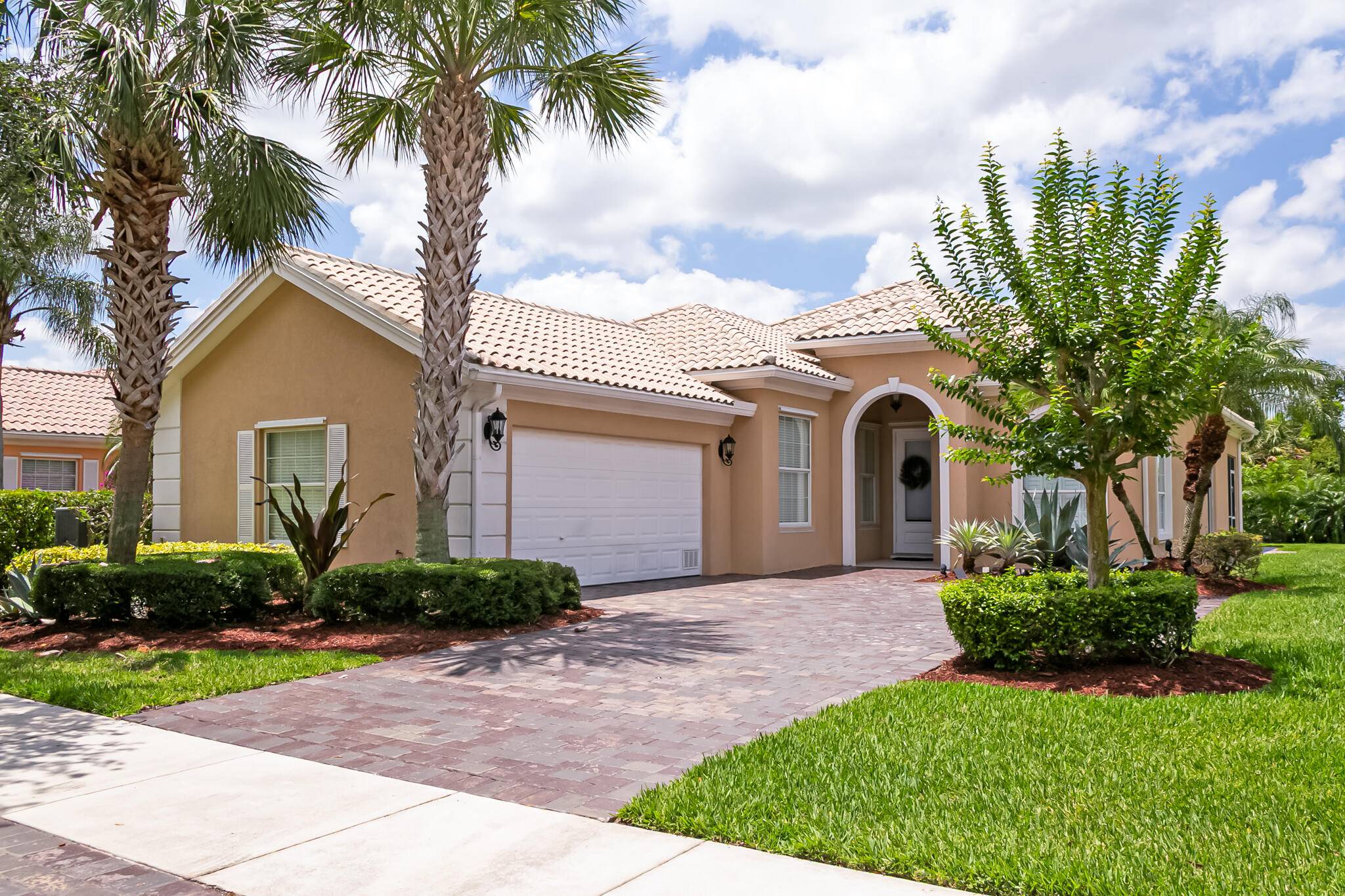 Welcome to The Lakes at Tradition a picturesque, established neighborhood known for its mature trees, winding streets, and walkable charm.