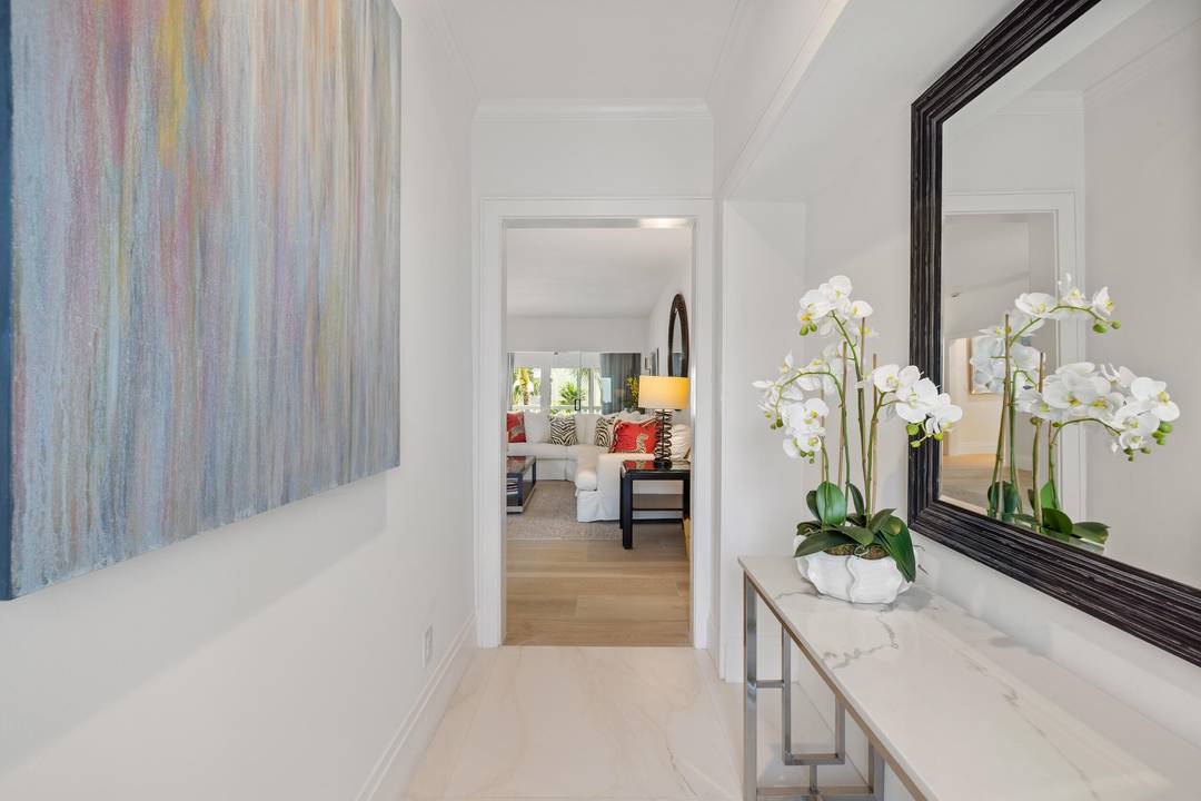 Step into effortless Palm Beach living with this beautifully renovated 2 bedroom, 2 bathroom condo in the iconic 300 S Ocean Blvd.