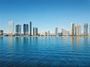 Bright 1 bedroom, 1 bath condo hotel unit on the 23rd floor with partial ocean views in Sunny Isles Beach.