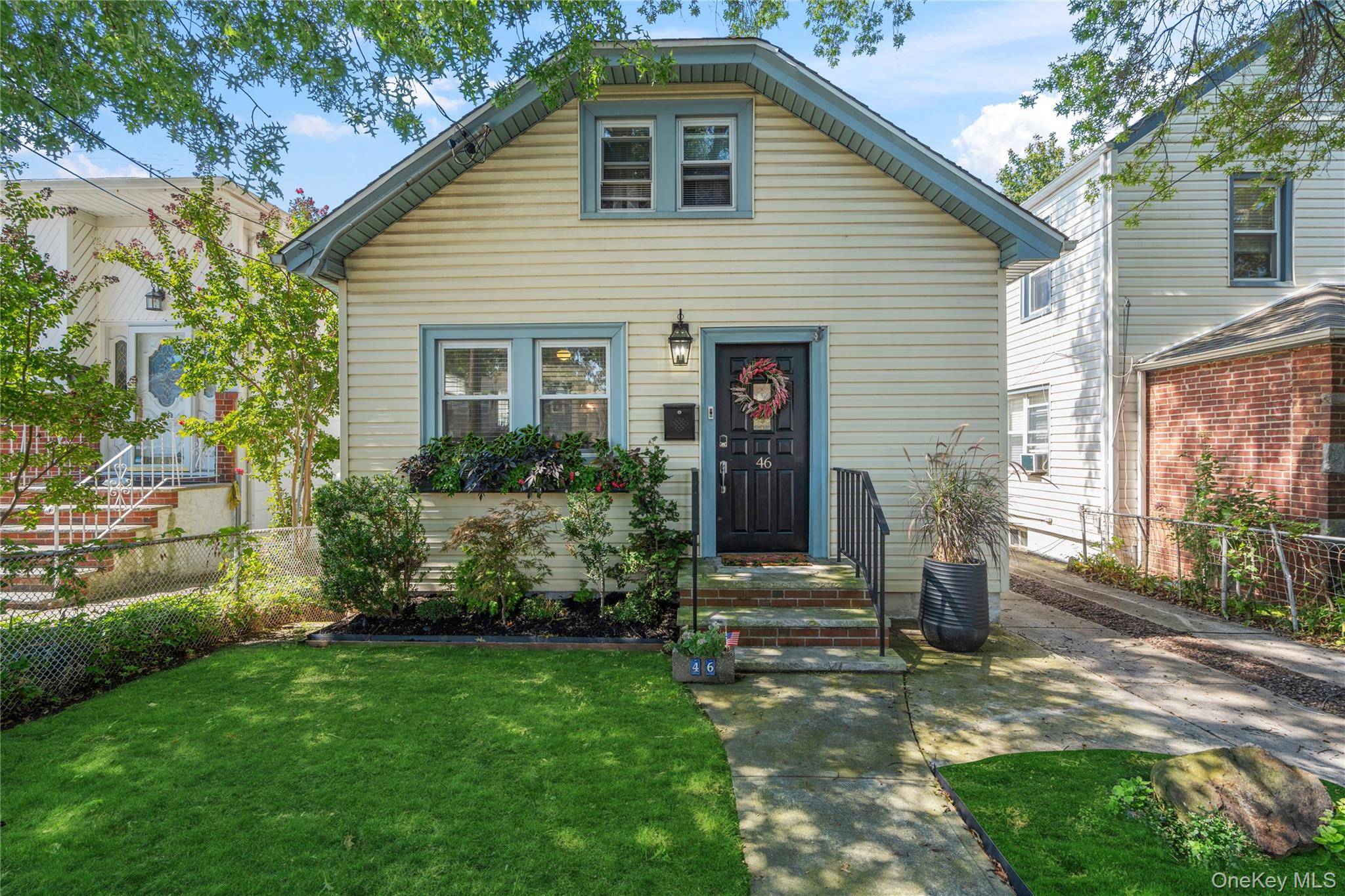 Welcome to 46 Sherwood Avenue, a beautifully renovated Cape Cod style home in the heart of Franklin Square.