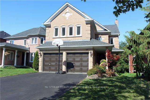 House In Desirable Aurora Grove With Conservation Ravine Back View.