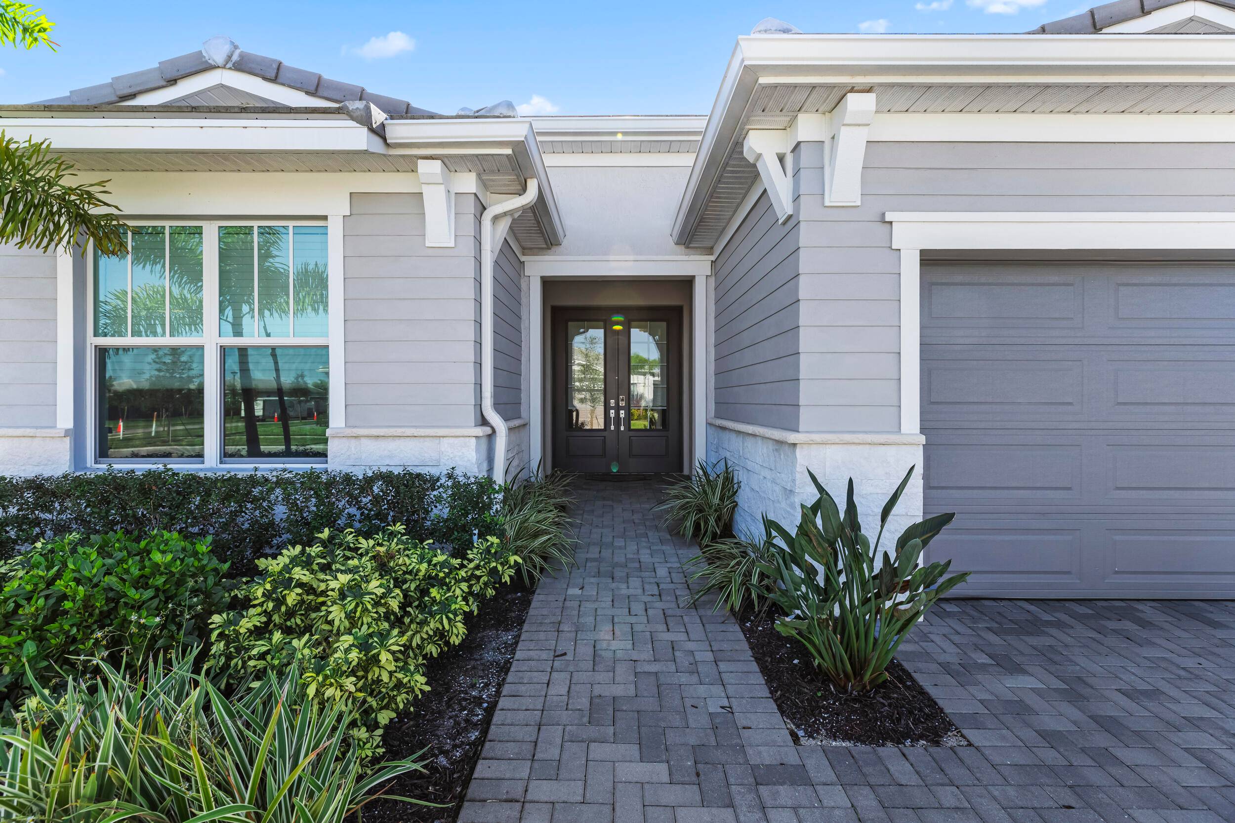 Experience the ultimate in luxury living with this stunning home in the prestigious community of Telaro at Tradition.