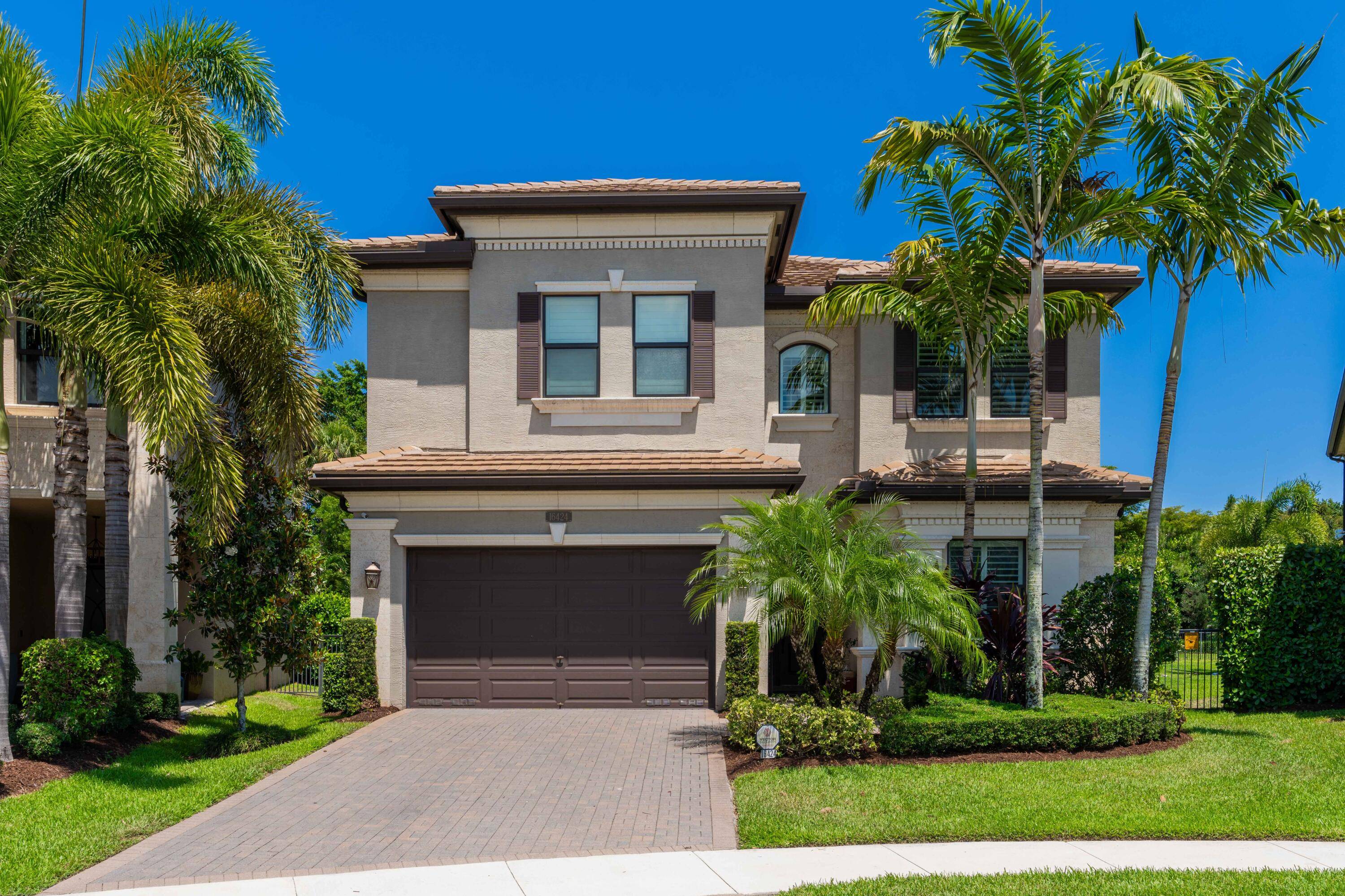 Welcome to this exquisite 4 bedroom, 4bath Somerset 2 story home in the Prestigious Seven Bridges community of Delray Beach.