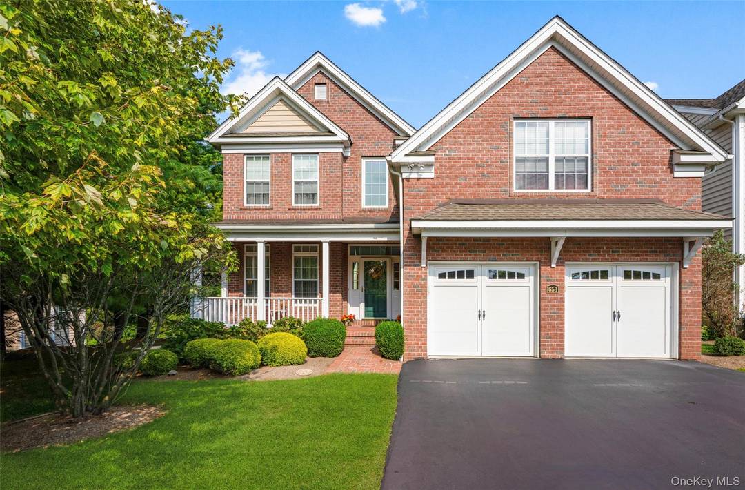 Stately brick colonial set on a premium homesite in the desirable Van Wyck Glen community in Fishkill, this home showcases custom construction with extensive upgrades and elegant finishes throughout.